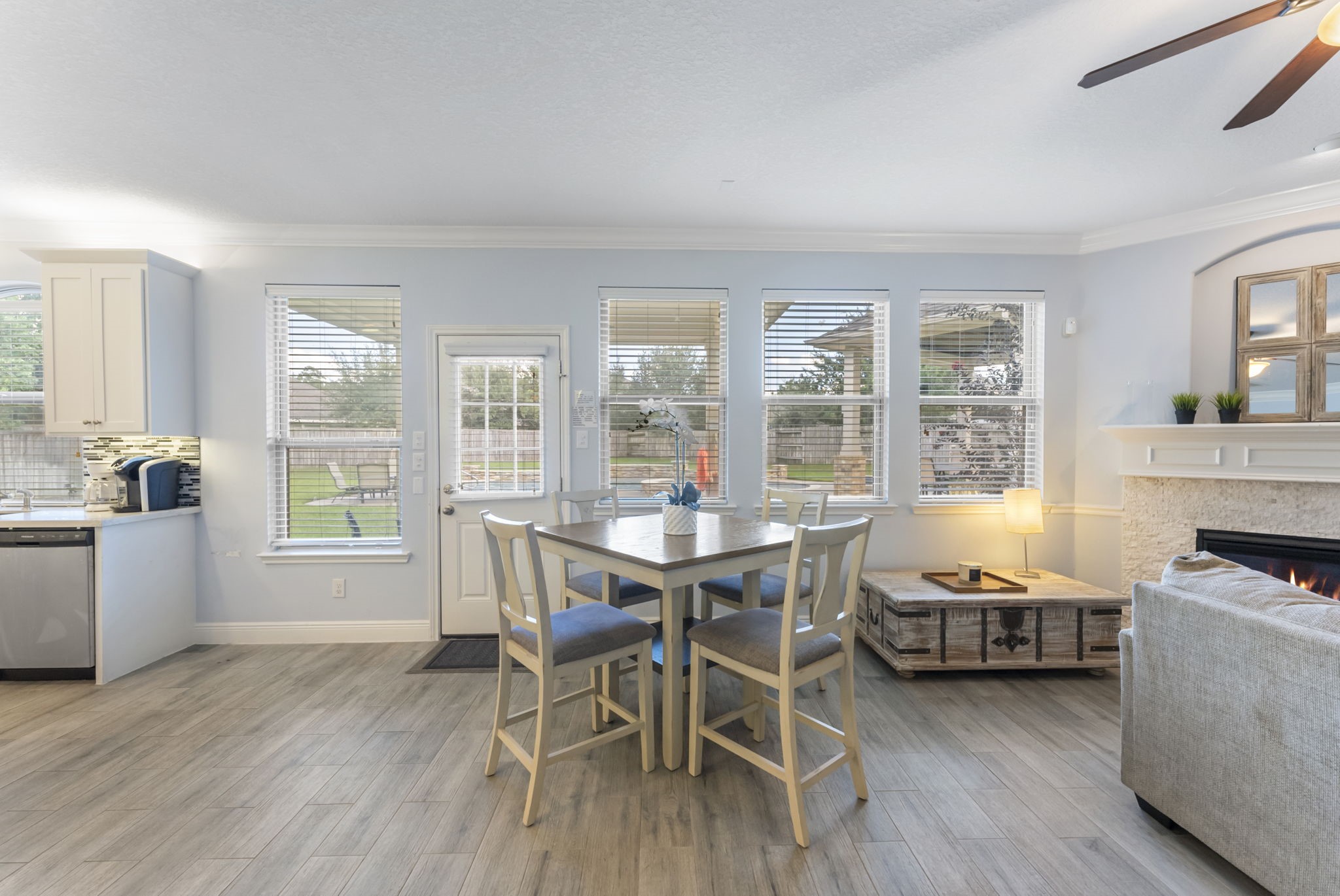 119 Wood Drake Place Tomball, TX 77375 - Photo 15 of 47 a view of a dining room with furniture a chandelier and wooden floor