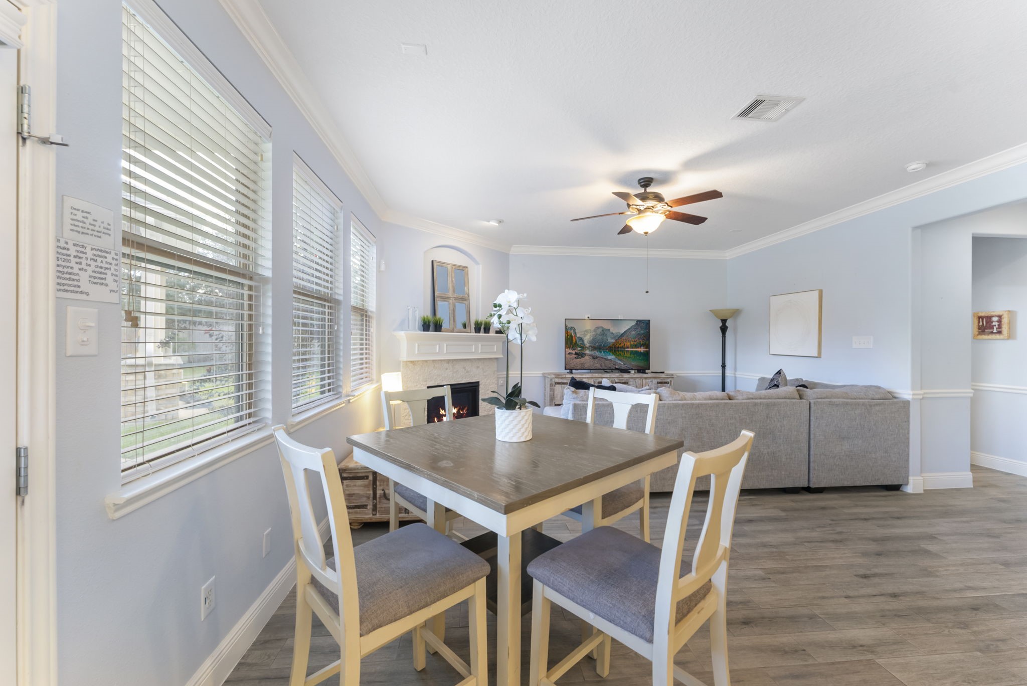 119 Wood Drake Place Tomball, TX 77375 - Photo 16 of 47 a view of a dining room with furniture window and wooden floor