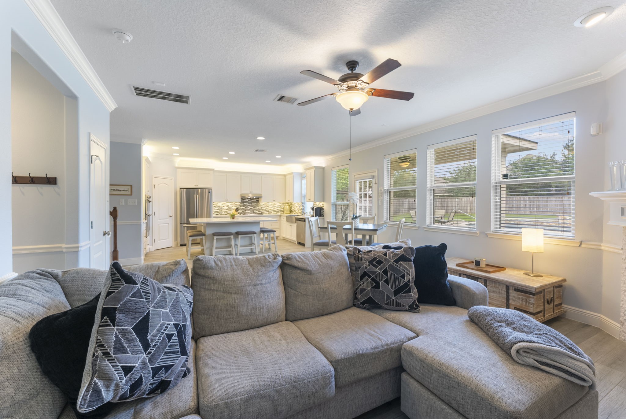 119 Wood Drake Place Tomball, TX 77375 - Photo 19 of 47 a living room with furniture and a large window