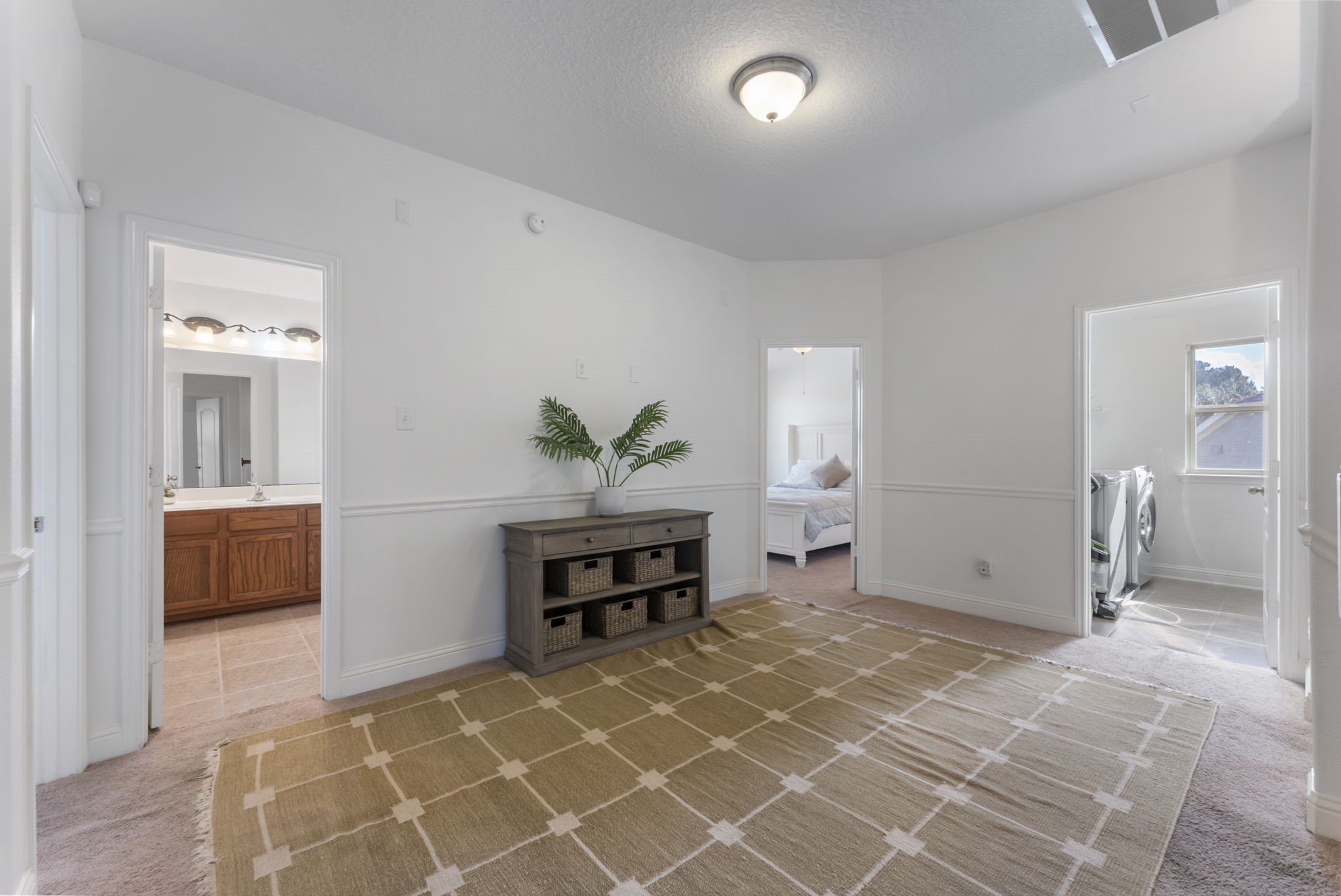 119 Wood Drake Place Tomball, TX 77375 - Photo 22 of 47 a view of a livingroom with furniture and a dinning area