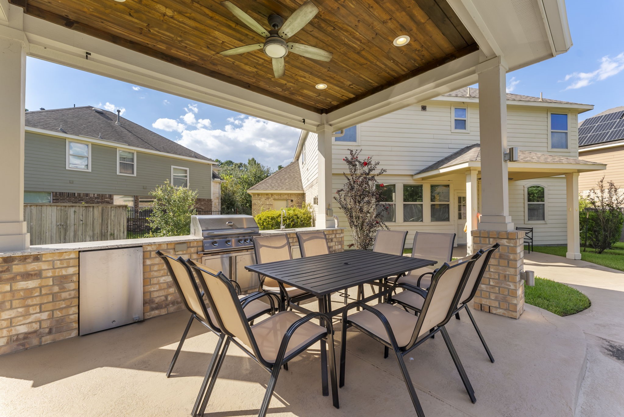 119 Wood Drake Place Tomball, TX 77375 - Photo 42 of 47 a view of a patio with a table and chairs