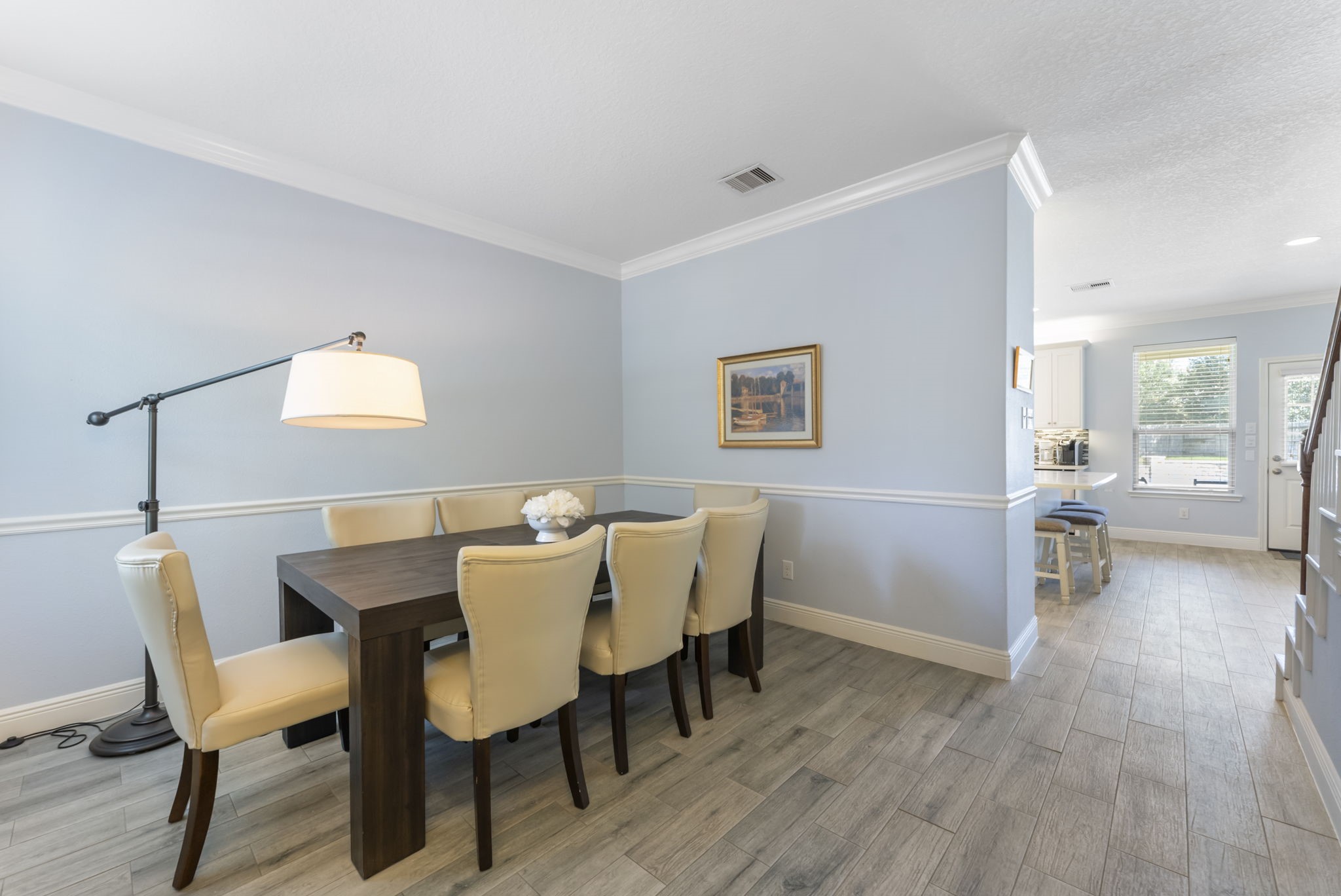 119 Wood Drake Place Tomball, TX 77375 - Photo 5 of 47 a view of a dining room with furniture and wooden floor