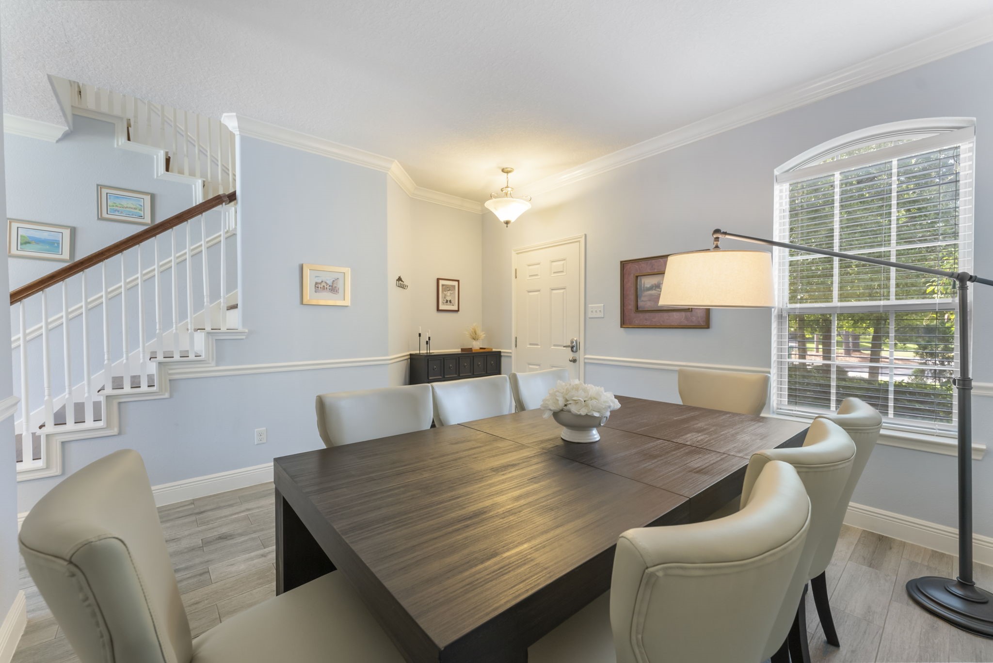 119 Wood Drake Place Tomball, TX 77375 - Photo 6 of 47 a view of a dining room with furniture and wooden floor
