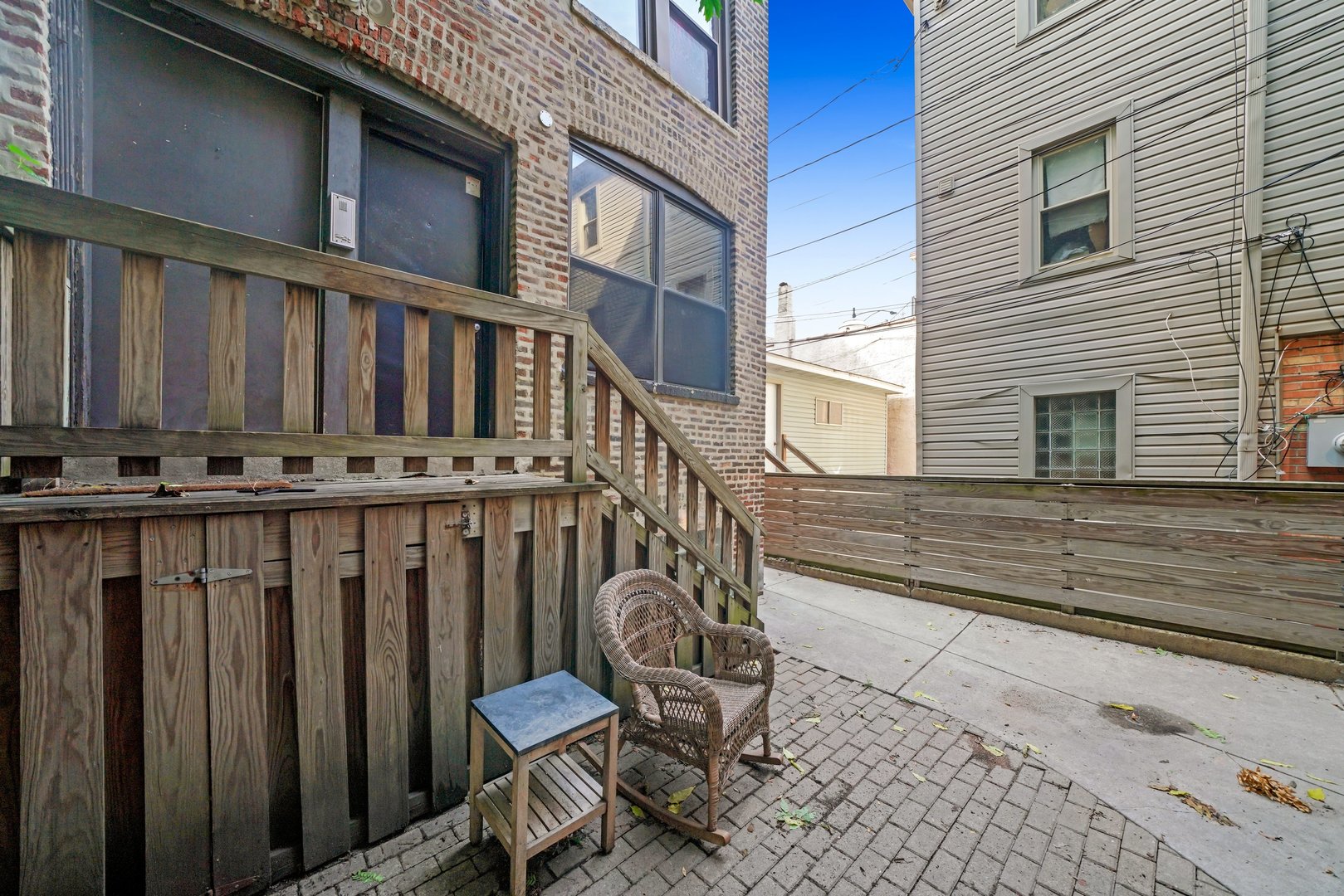 464 North Aberdeen Street, Unit 1R Chicago, IL 60642 - Photo 14 of 16 a view of a chair with wooden fence