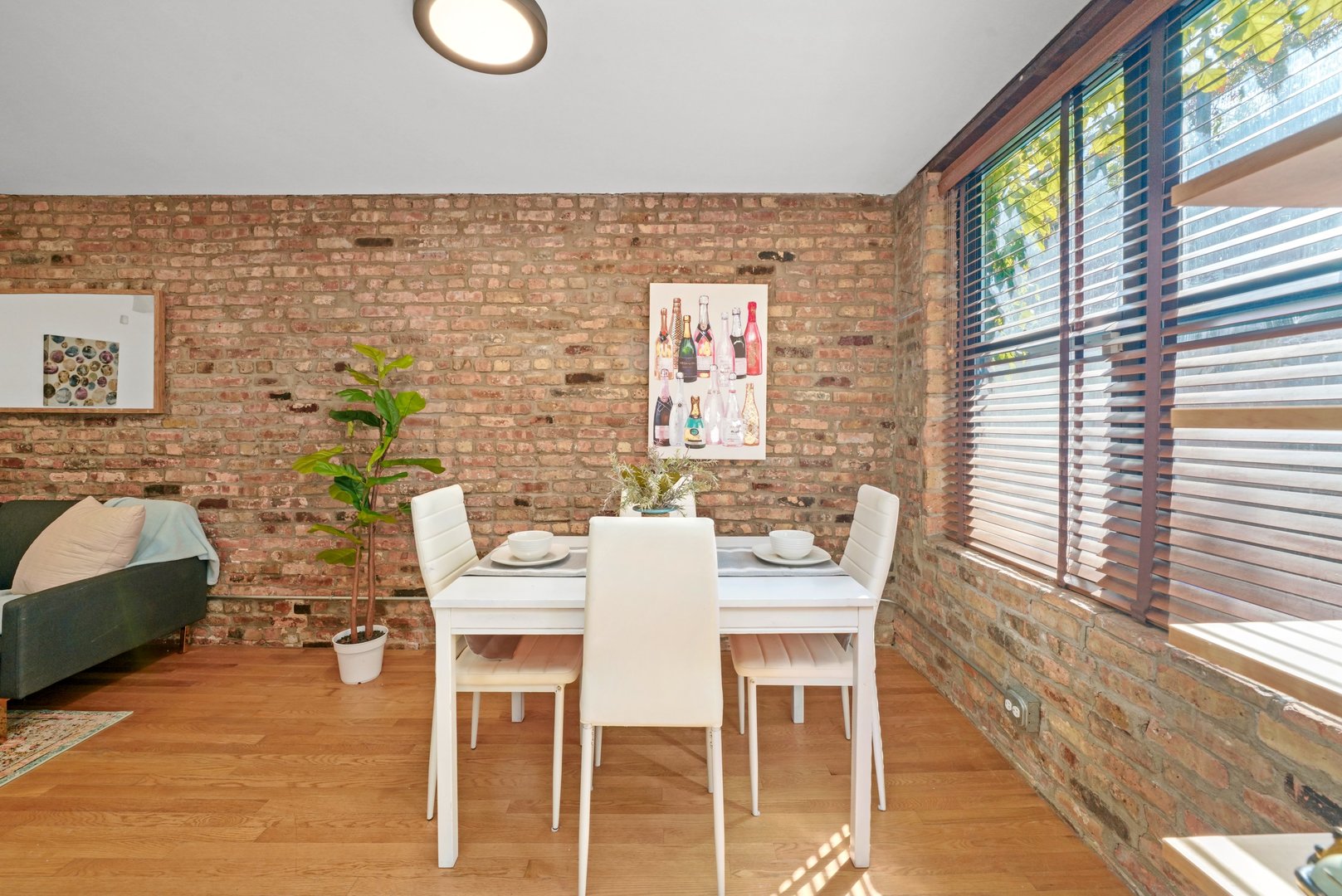 464 North Aberdeen Street, Unit 1R Chicago, IL 60642 - Photo 5 of 16 a dining room with furniture and window