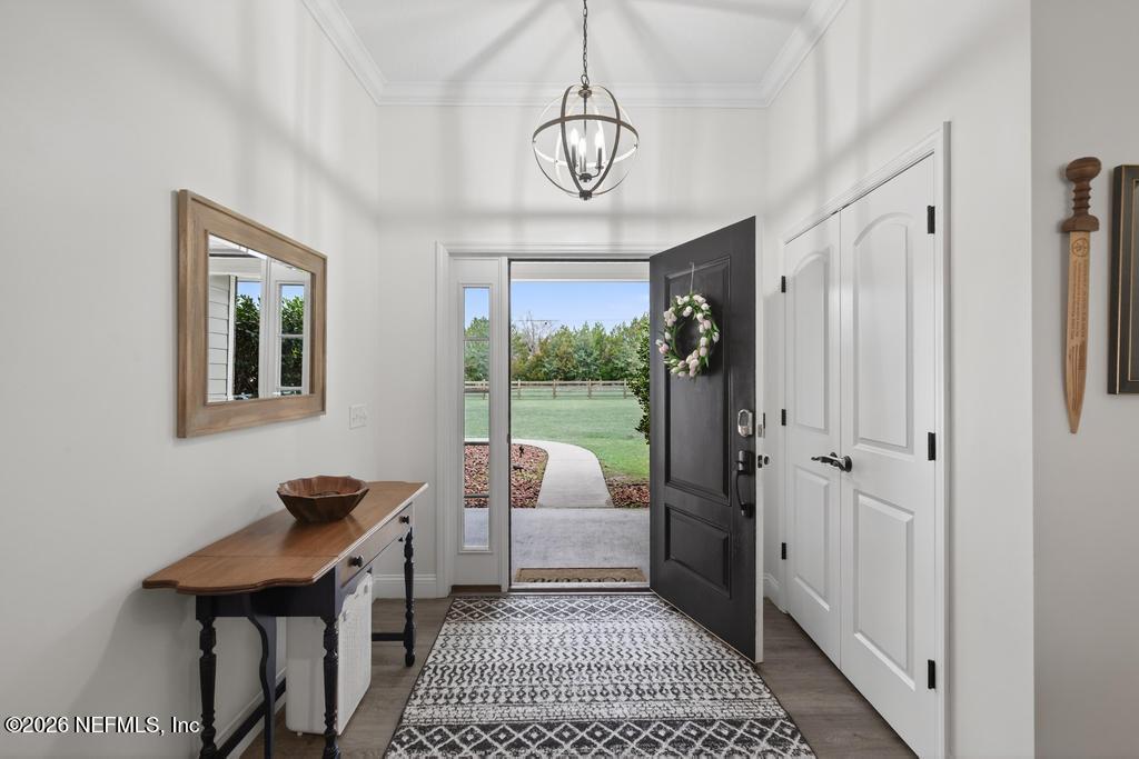 37575 Kings Ferry Road Hilliard, FL 32046 - Photo 16 of 83 a view of a room with a table and chairs