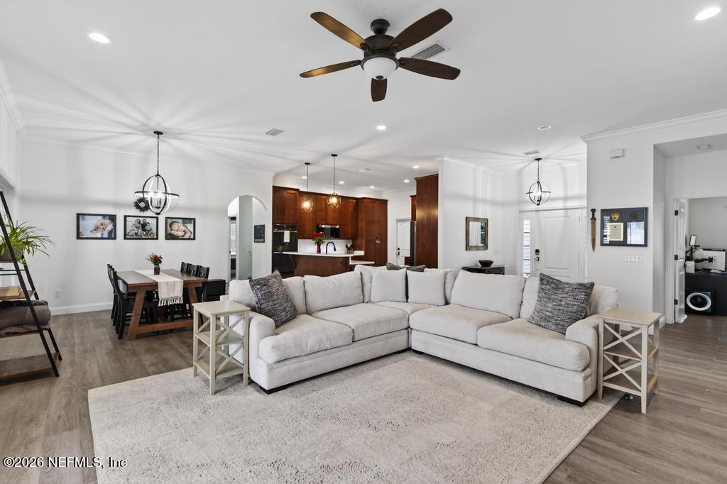37575 Kings Ferry Road Hilliard, FL 32046 - Photo 20 of 83 a living room with furniture and a wooden floor