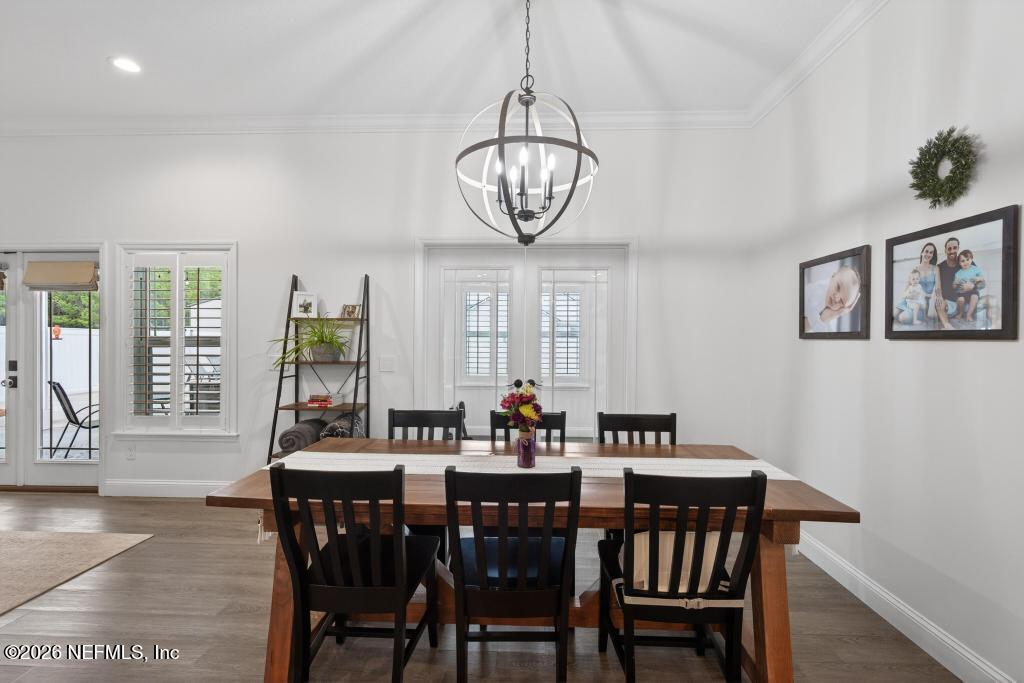 37575 Kings Ferry Road Hilliard, FL 32046 - Photo 25 of 83 a view of a dining room with furniture window and wooden floor