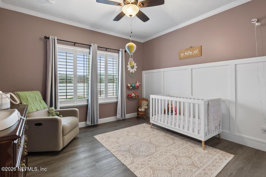 37575 Kings Ferry Road Hilliard, FL 32046 - Photo 45 of 83 a view of a livingroom with furniture and a ceiling fan