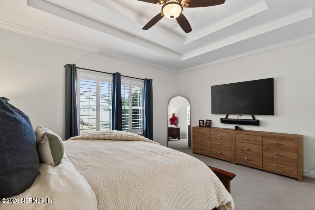 37575 Kings Ferry Road Hilliard, FL 32046 - Photo 56 of 83 a bedroom with a bed and a flat screen tv