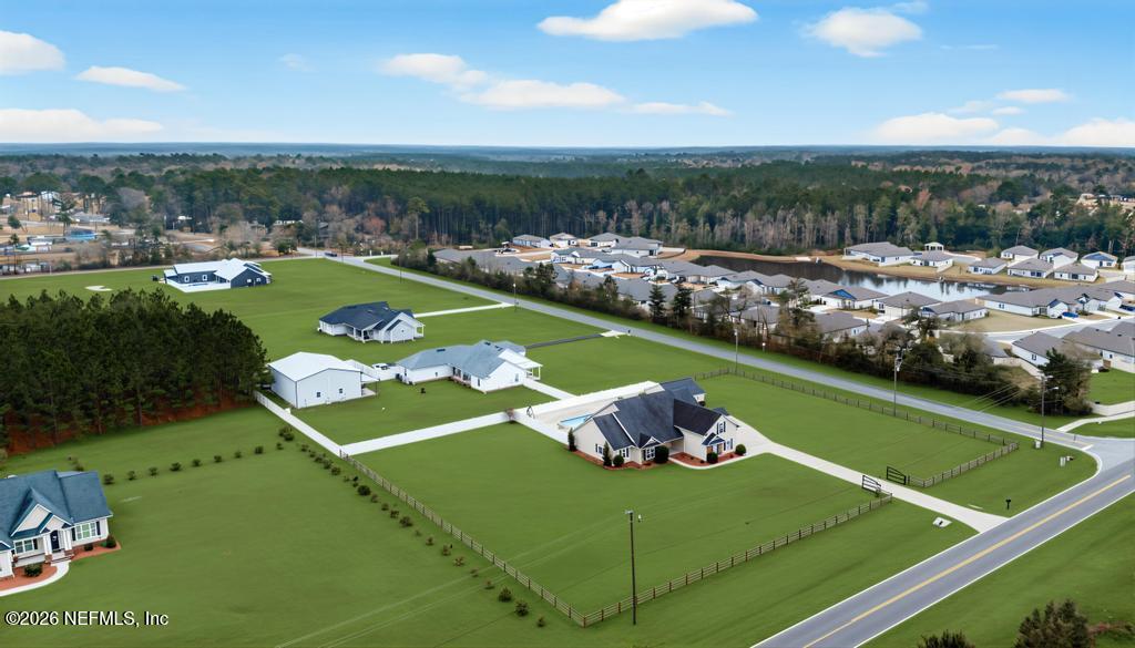 37575 Kings Ferry Road Hilliard, FL 32046 - Photo 73 of 83 a view of a golf course with a outdoor space