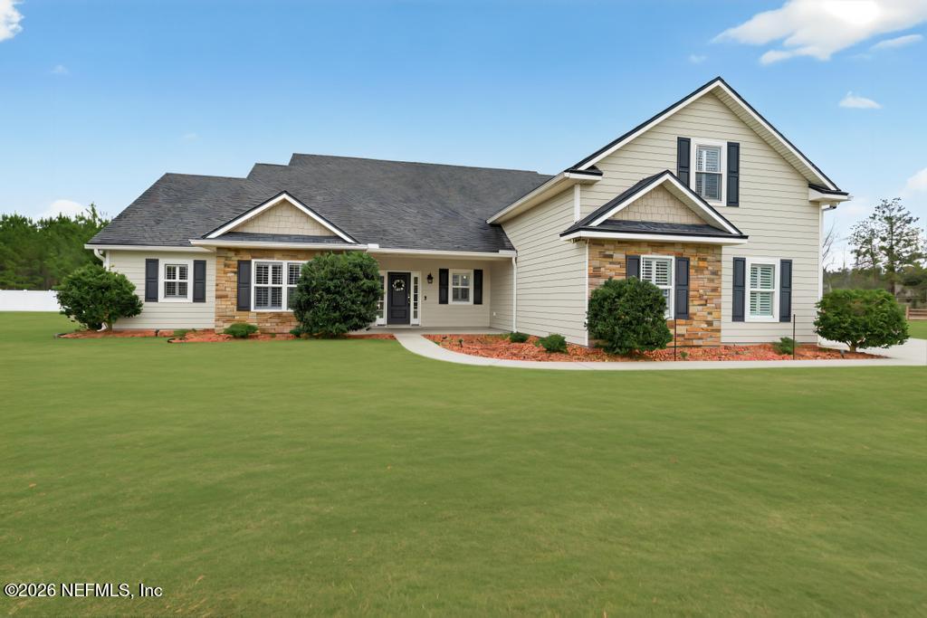 37575 Kings Ferry Road Hilliard, FL 32046 - Photo 83 of 83 a front view of a house with a yard