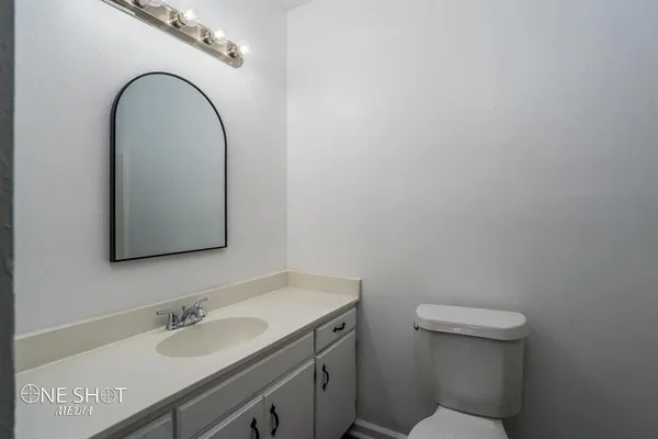 a bathroom with a sink and a toilet