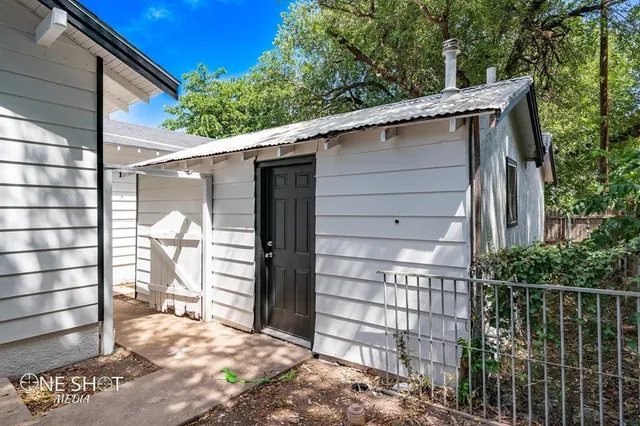 a view of outdoor space and front view of a house