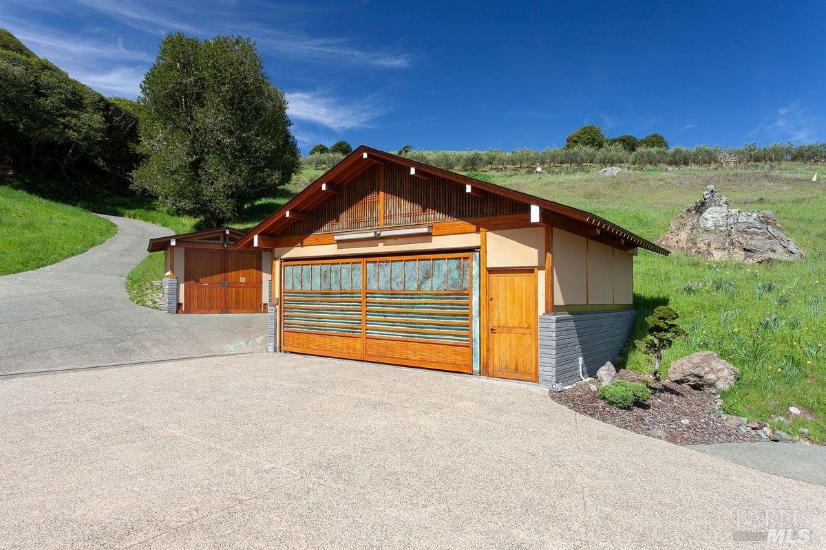 333-345 Willow Road Nicasio, CA 94946 - Photo 14 of 44 front view of a house with a garage