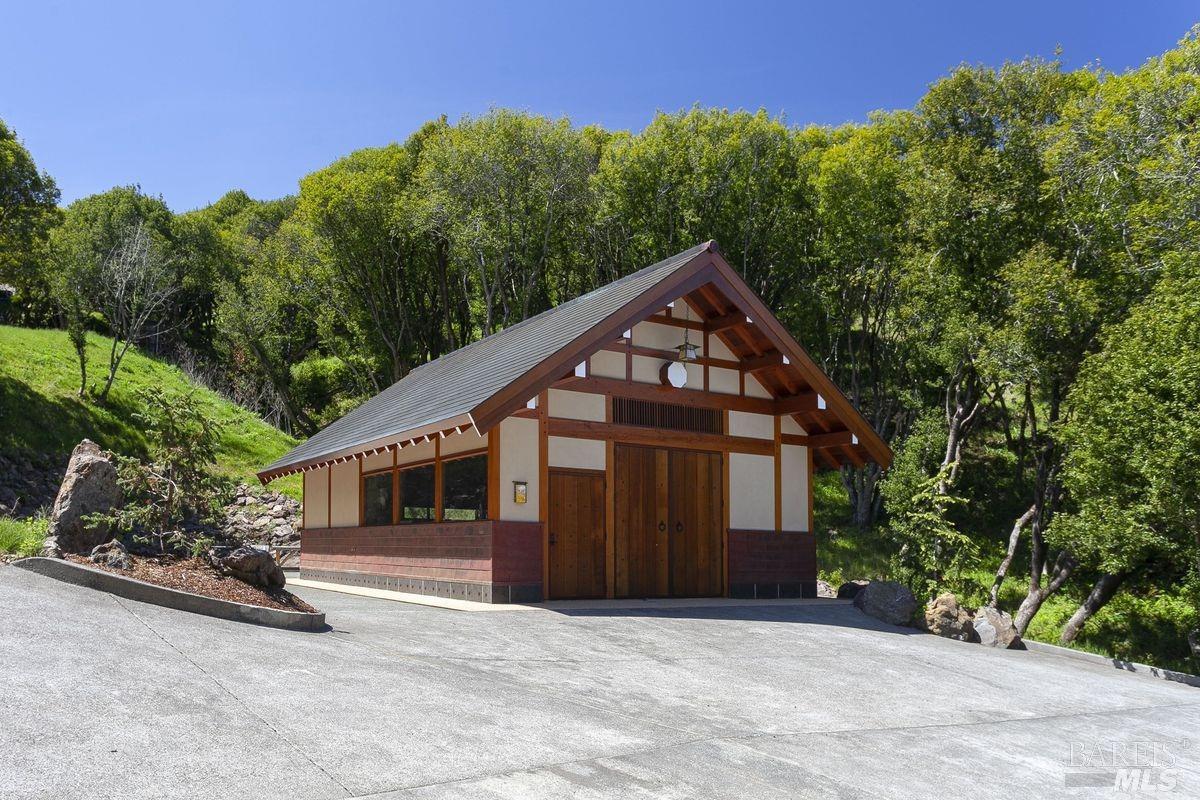 333-345 Willow Road Nicasio, CA 94946 - Photo 30 of 44 a front view of a house with garden