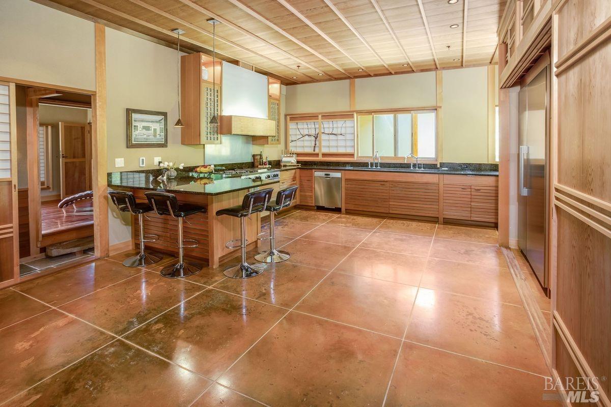 333-345 Willow Road Nicasio, CA 94946 - Photo 6 of 44 a kitchen with stainless steel appliances a sink and counter space