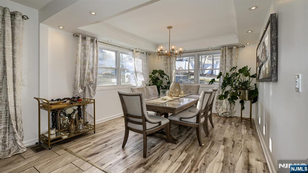 224 Pompton Road Haledon, NJ 07508 - Photo 13 of 34 a view of a dining room with furniture window and wooden floor