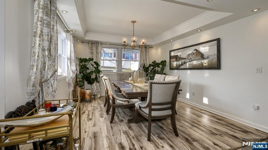 224 Pompton Road Haledon, NJ 07508 - Photo 14 of 34 a view of a dining room with furniture and chandelier