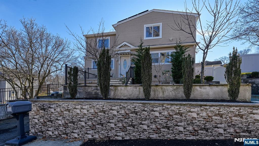 224 Pompton Road Haledon, NJ 07508 - Photo 2 of 34 a front view of a house with garden
