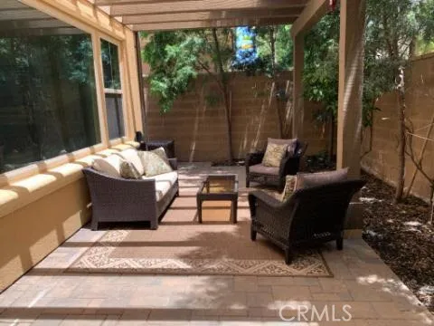 a view of living room filled with furniture