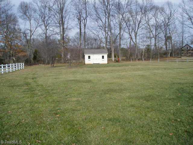 7836 Clinard Farms Road High Point, NC 27265 - Photo 2 of 9 Other. View of Huge Level Backyard. Plenty of room to Play and Entertain. Backyard Also Features Apple, Cherry, Peach and Fig Trees.