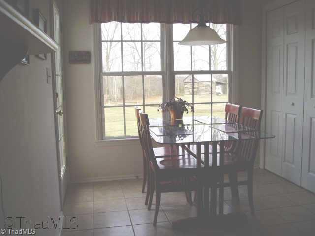 7836 Clinard Farms Road High Point, NC 27265 - Photo 6 of 9 Other. Bright Breakfast Room with a Great View of the Backyard for a More Casual Dining Space