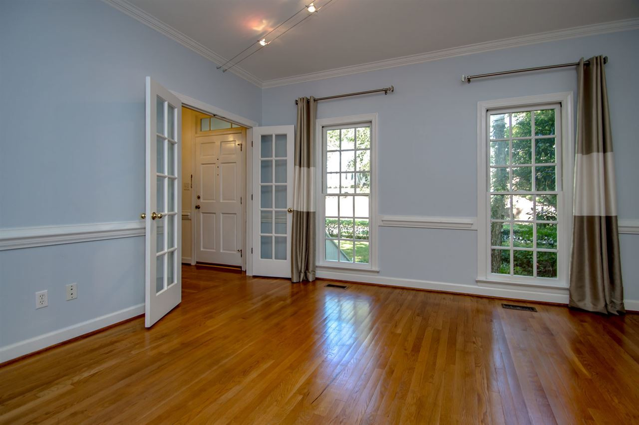 4609 Gramercy Court Raleigh, NC 27609 - Photo 7 of 22 Living room has great moldings and french doors to both the foyer and family room. It could be a great reading room, home office or music room. Living Room