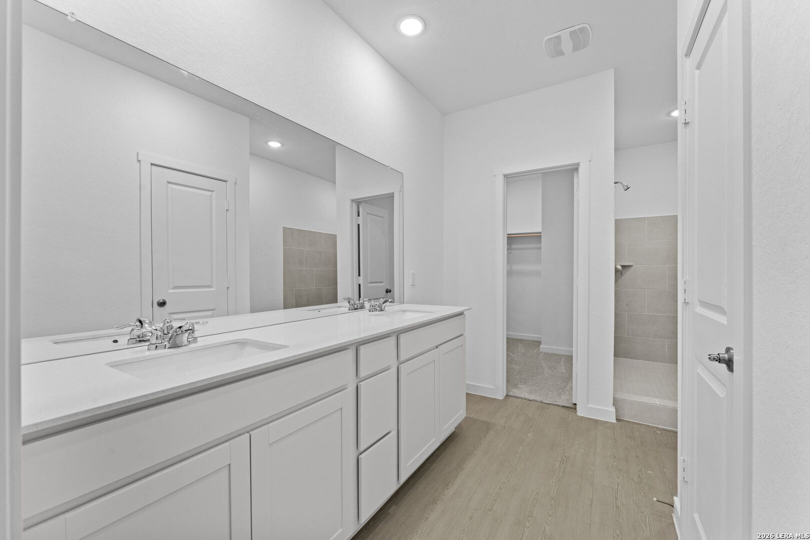 2331 Fort Davis Pass Marion, TX 78124 - Photo 23 of 28 a spacious bathroom with a double vanity sink mirror and double