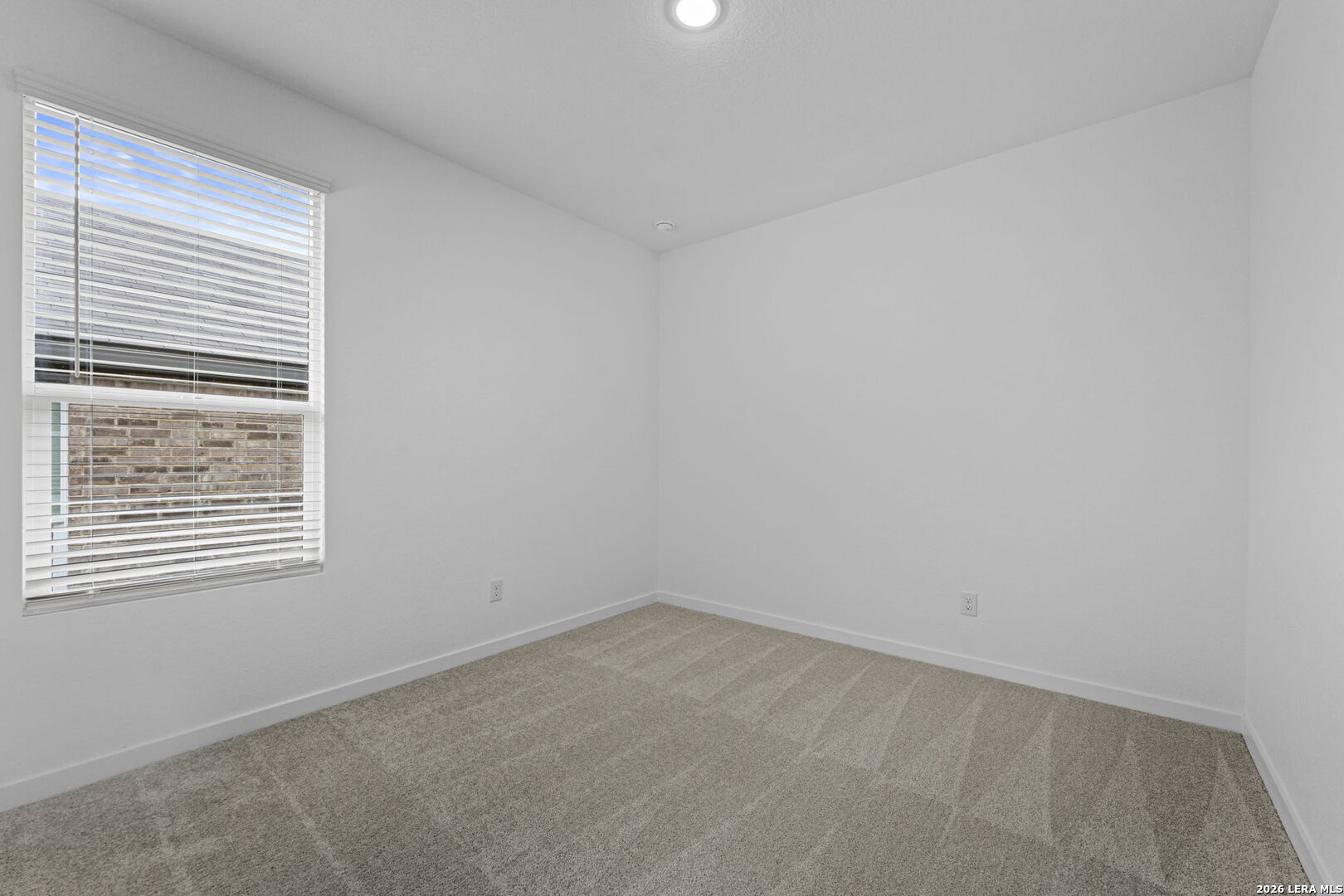 2331 Fort Davis Pass Marion, TX 78124 - Photo 3 of 28 an empty room with a window