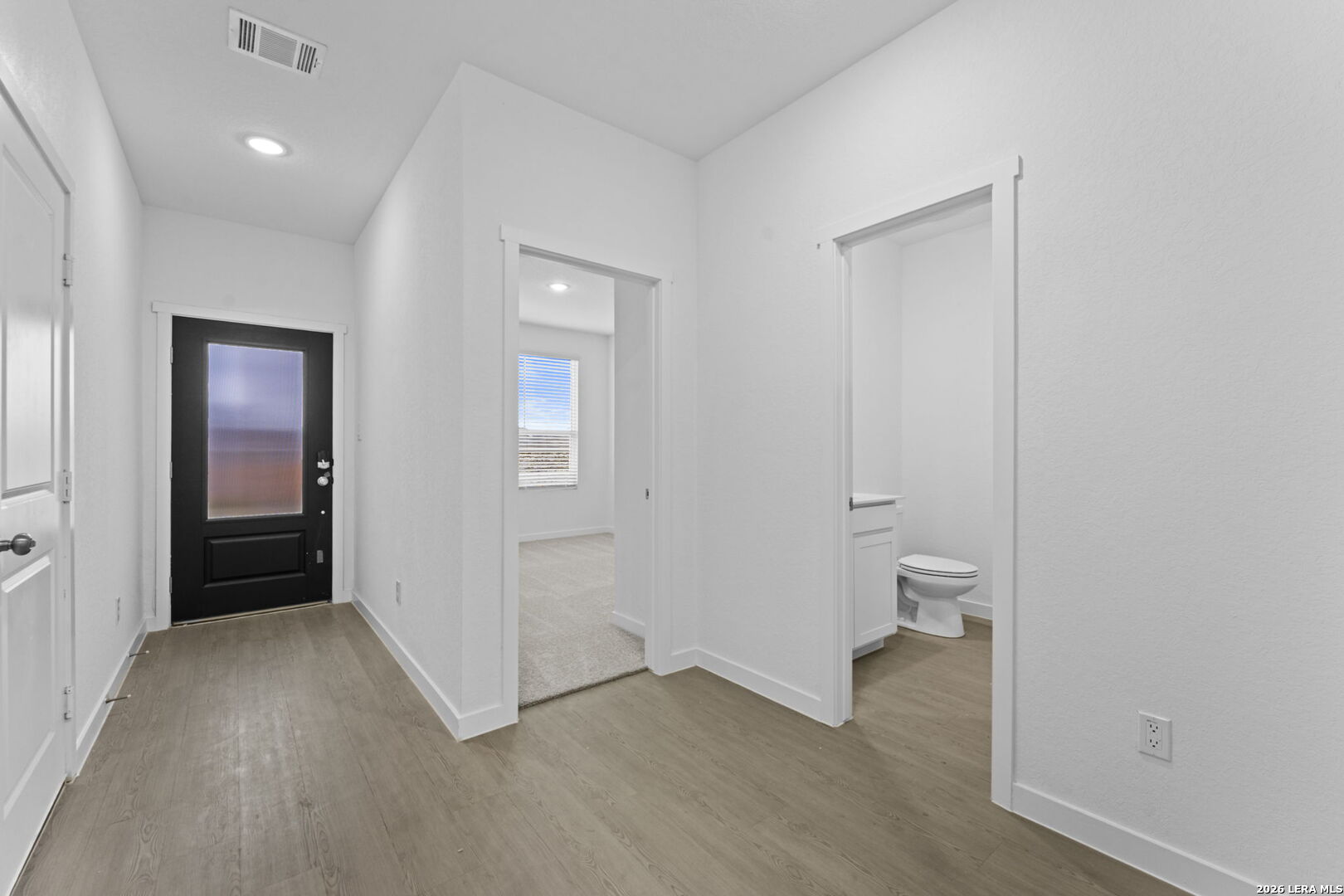 2331 Fort Davis Pass Marion, TX 78124 - Photo 5 of 28 wooden floor and closet in a room