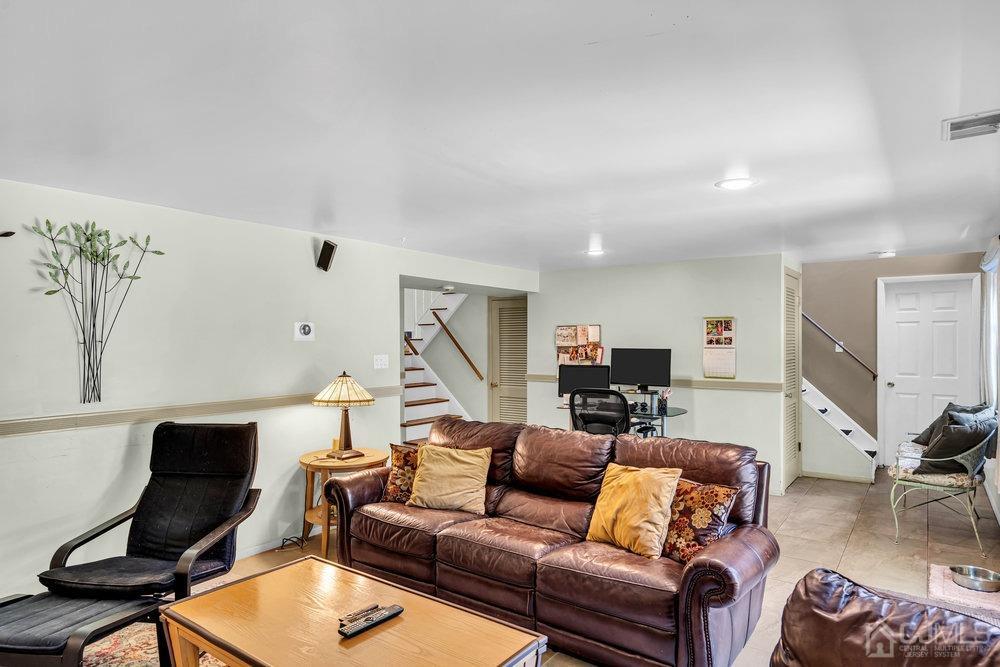 24 Chandler Road Edison, NJ 08820 - Photo 12 of 30 a living room with furniture