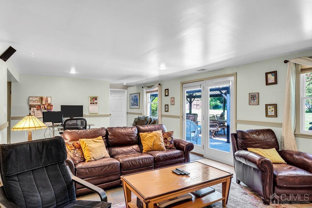 24 Chandler Road Edison, NJ 08820 - Photo 14 of 30 a living room with furniture and a wooden floor