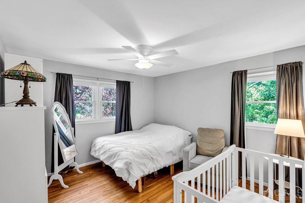 24 Chandler Road Edison, NJ 08820 - Photo 18 of 30 a bedroom with two beds and a window