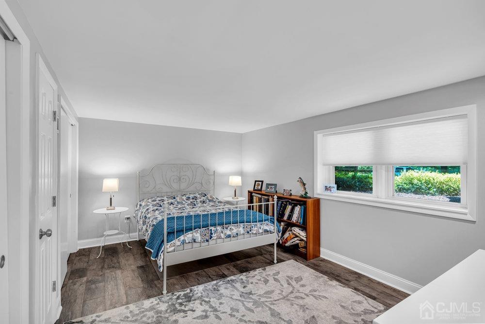 24 Chandler Road Edison, NJ 08820 - Photo 21 of 30 a bedroom with a bed and a window