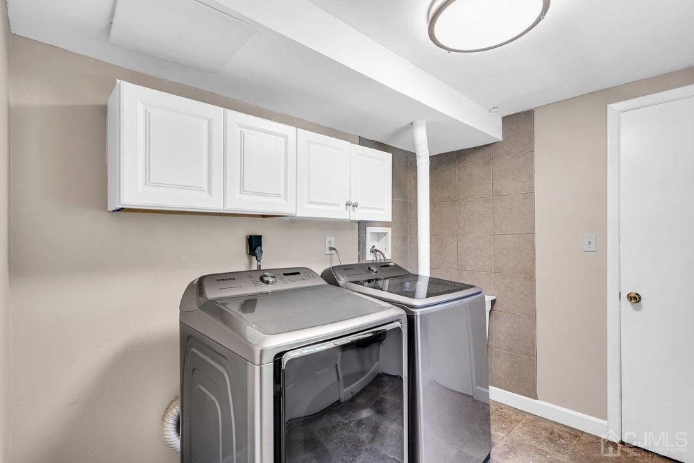 24 Chandler Road Edison, NJ 08820 - Photo 23 of 30 a utility room with sink dryer and washer