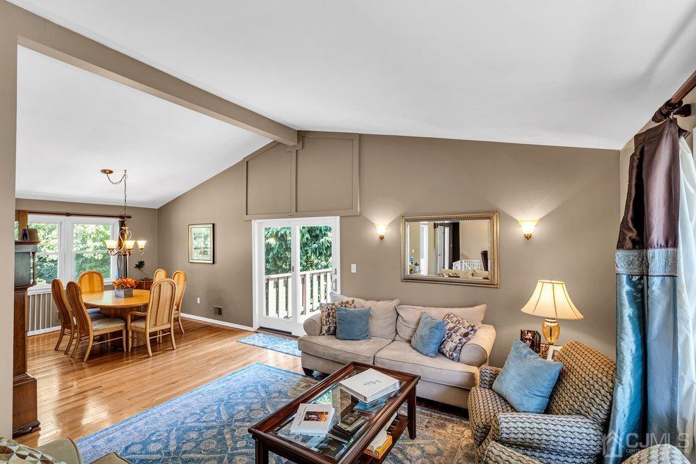 24 Chandler Road Edison, NJ 08820 - Photo 6 of 30 a living room with furniture and a wooden floor