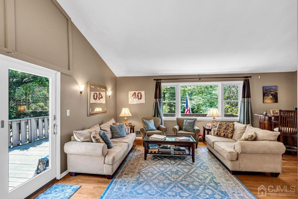 24 Chandler Road Edison, NJ 08820 - Photo 7 of 30 a living room with furniture and a large window