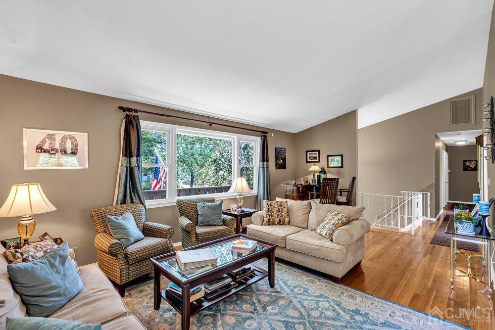 24 Chandler Road Edison, NJ 08820 - Photo 8 of 30 a living room with furniture and a large window