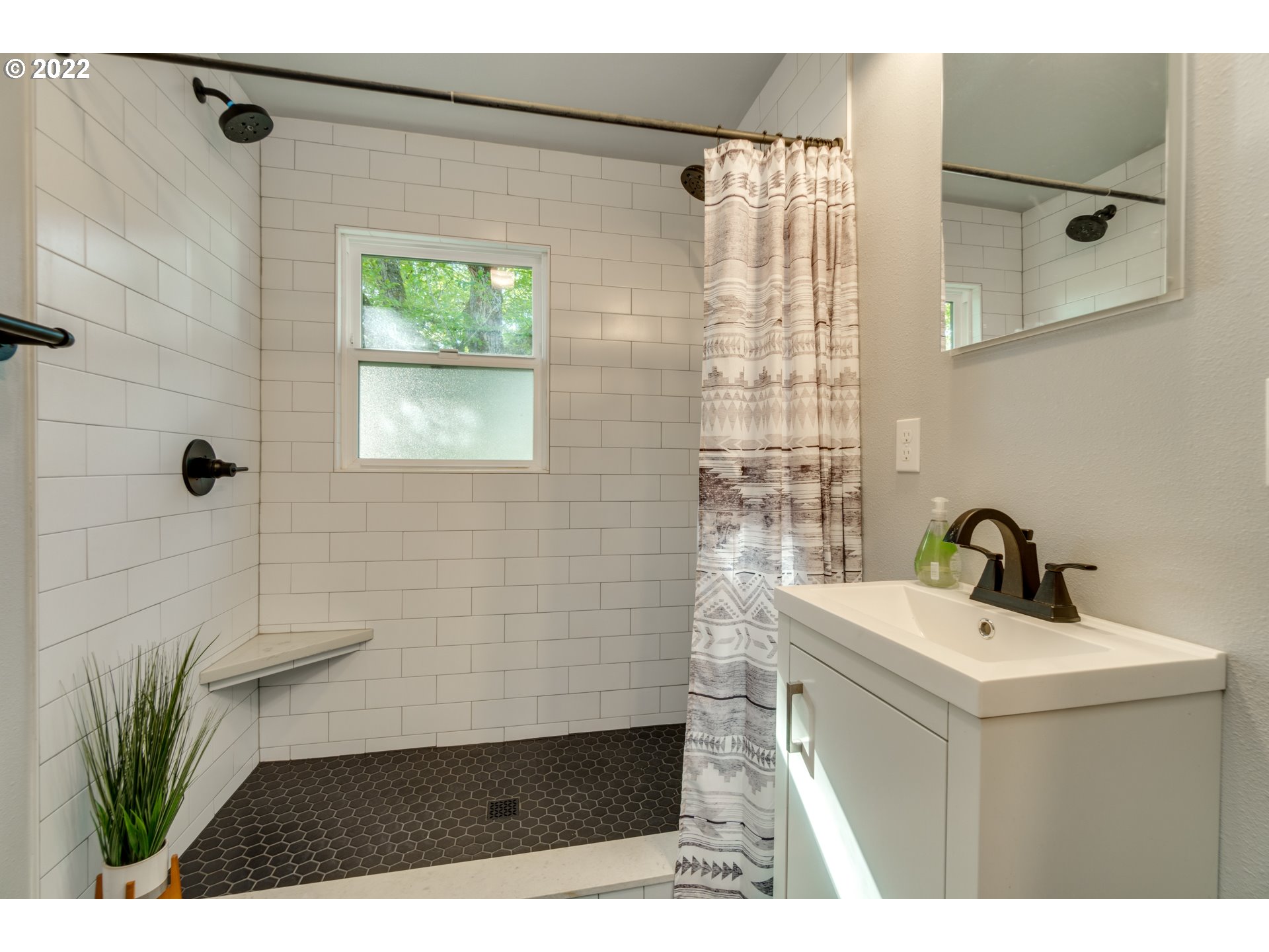 20959 South Jubb Road Estacada, OR 97023 - Photo 5 of 27 a bathroom with a sink a mirror and a shower