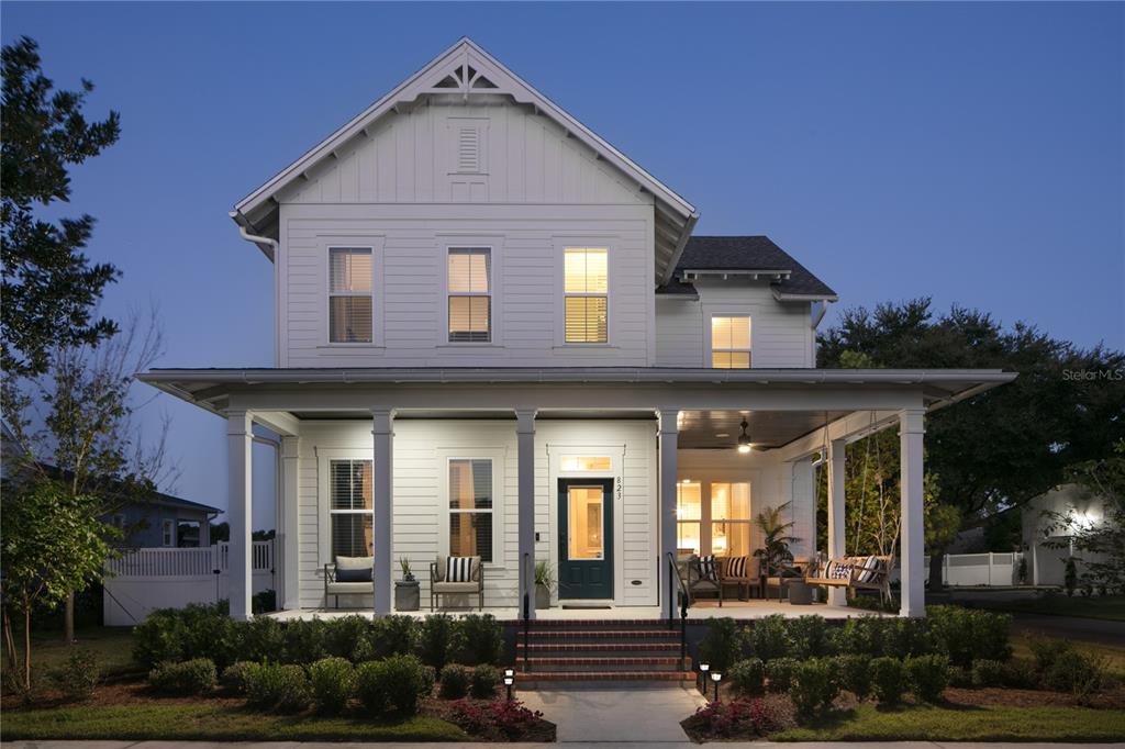 front view of a house with a yard