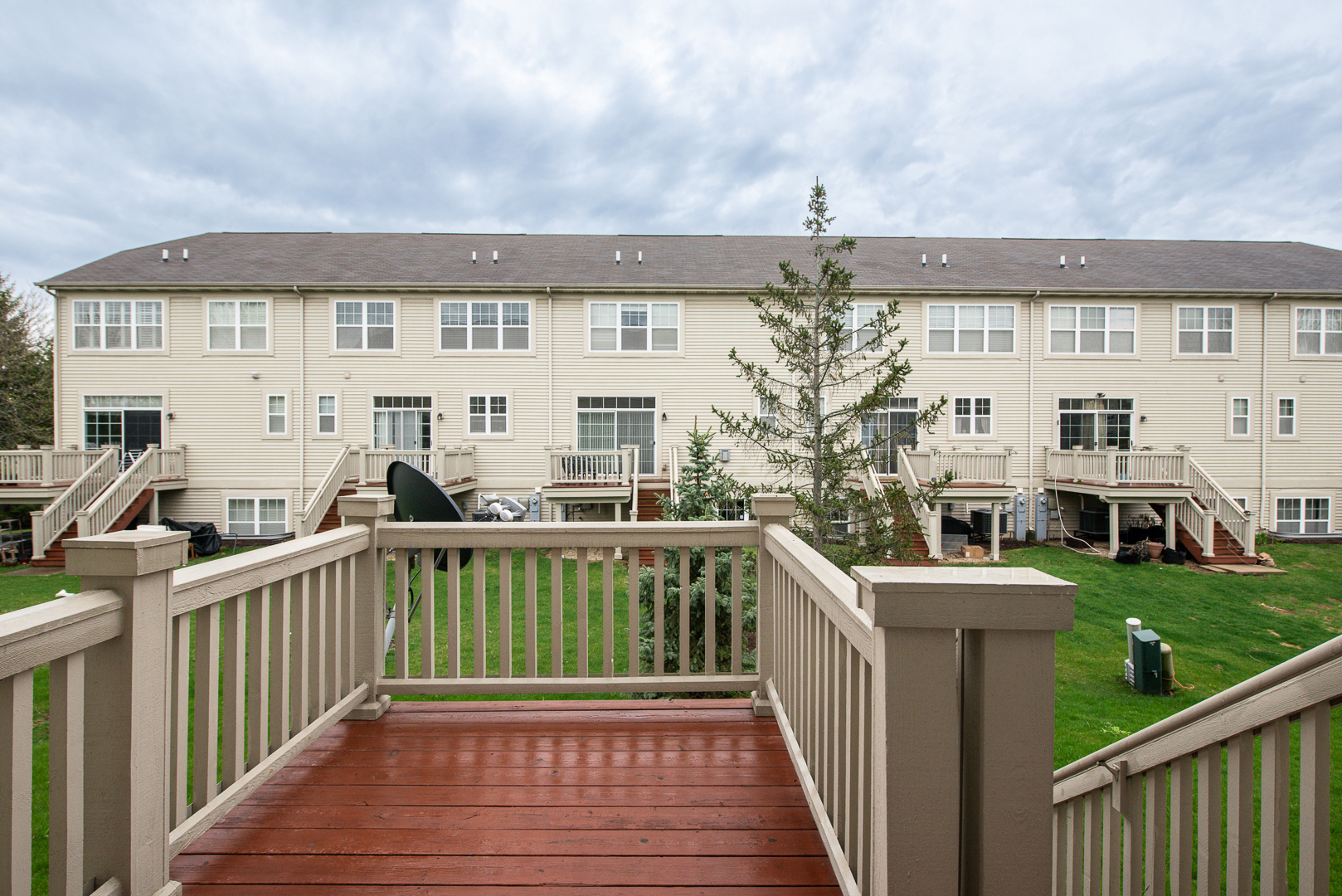401 North Commerce Street, Unit 401 Aurora, IL 60504 - Photo 20 of 20 a view of a house with a deck