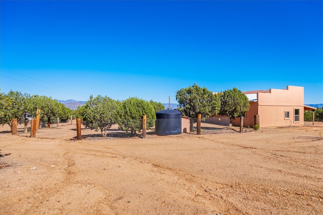 10374 East Happy Trails Road Kingman, AZ 86401 - Photo 52 of 68 a view of a road with a building in the background