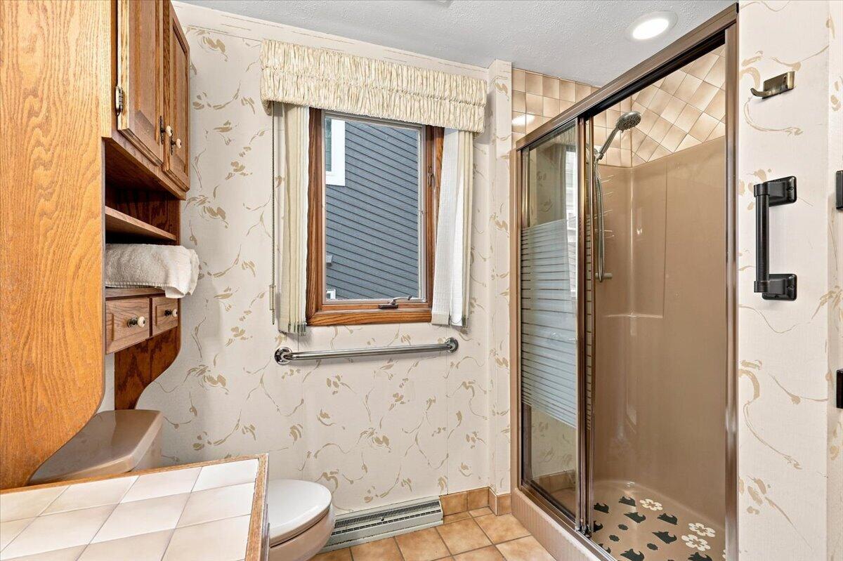 N7295 Ridge Road Plymouth, WI 53073 - Photo 30 of 70 Primary bath has walk in shower and 2 va
