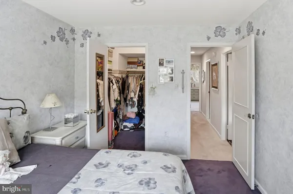a view of a bedroom window and hallway