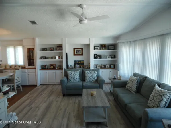 a living room with furniture and a couch