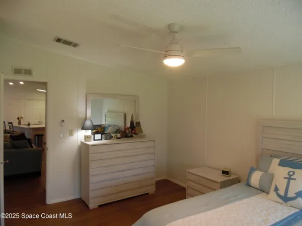 a bedroom with a bed and furniture