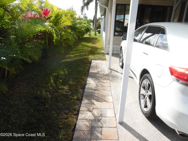 a view of a porch with furniture