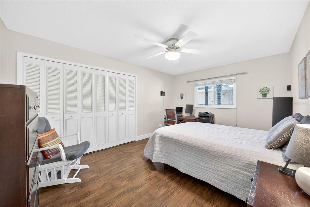 517 Roughbeard Road Winter Park, FL 32792 - Photo 19 of 53 a bedroom with a bed and a window
