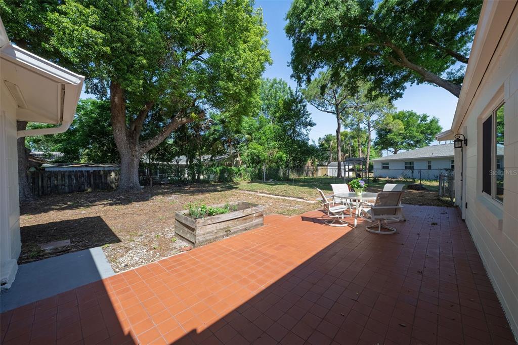 517 Roughbeard Road Winter Park, FL 32792 - Photo 21 of 53 a view of a yard with swimming pool
